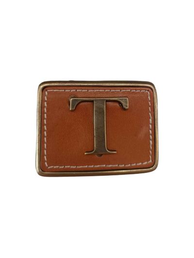 Hebilla inicial relieve T
