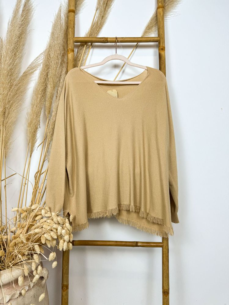 Jersey camel con flecos