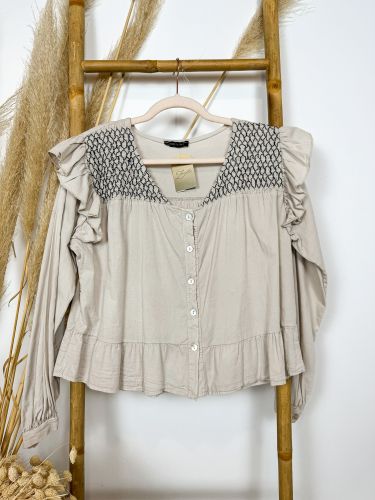 Blusa evasé taupe pechera con hilo