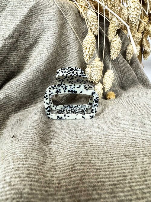 Pinza puntitos negros