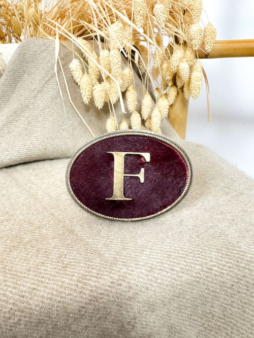 Hebilla ovalada pelo burdeos inicial chapa F