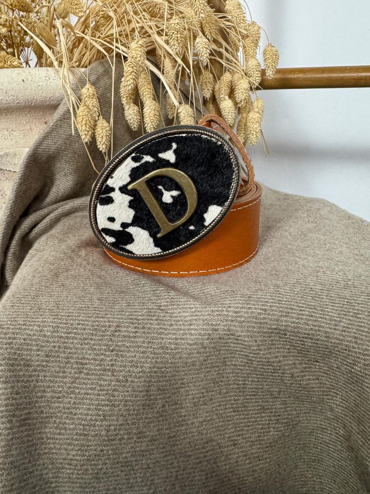 Hebilla ovalada pelo vaca inicial...