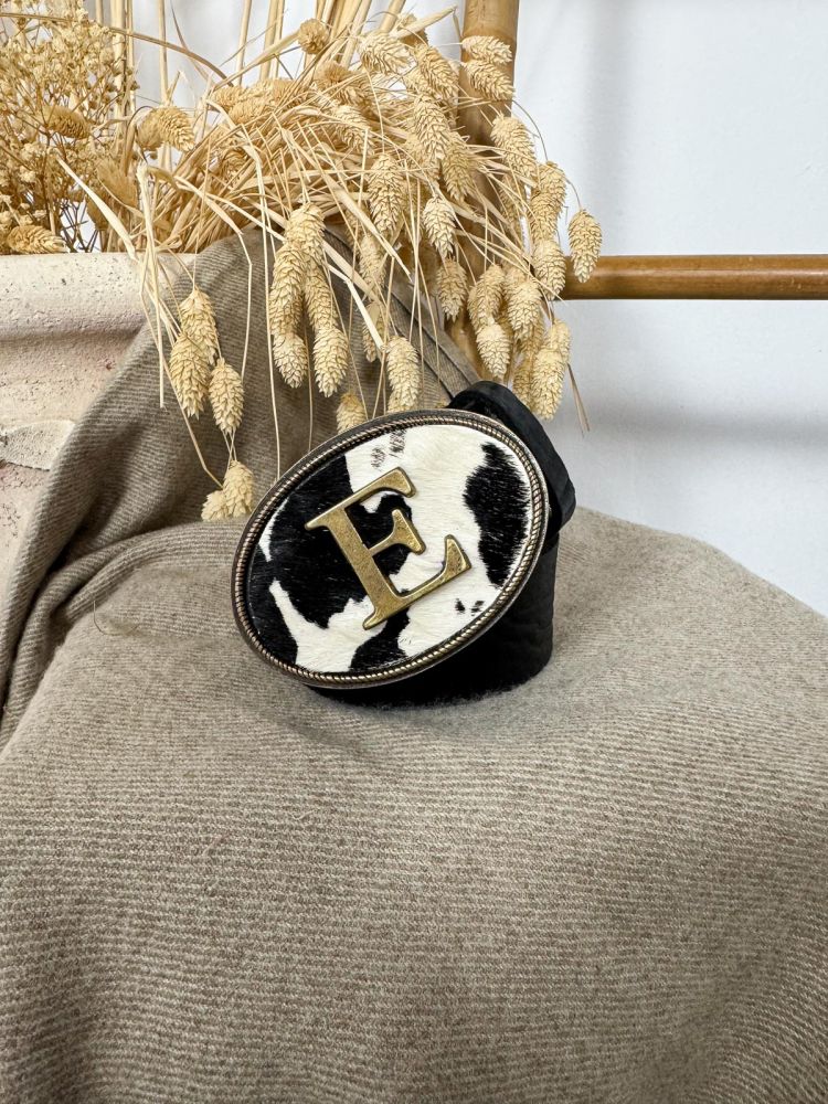 Hebilla ovalada pelo vaca inicial...