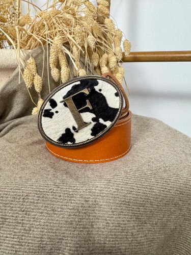 Hebilla ovalada pelo vaca inicial relieve F 2