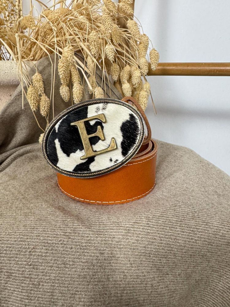 Hebilla ovalada pelo vaca inicial...