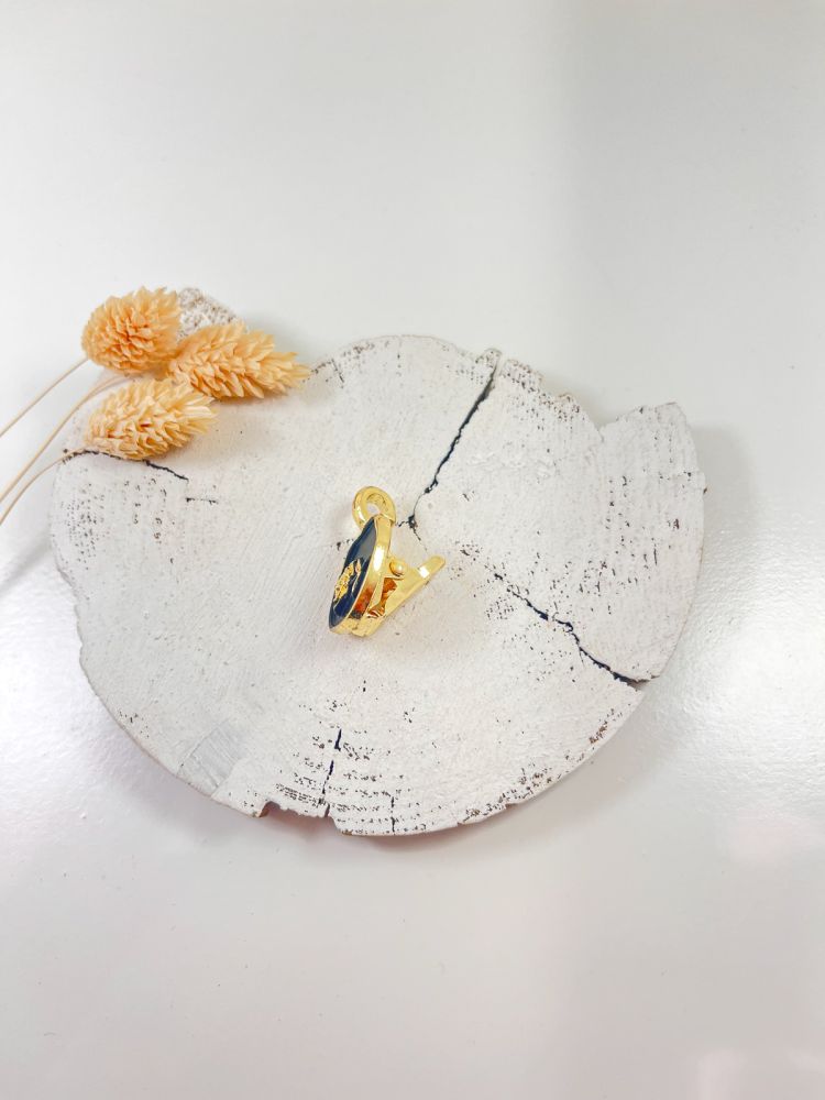 Broche pinza negro flor dorada