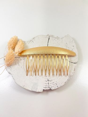 Peinecillo ovalado alargado curvado rugoso