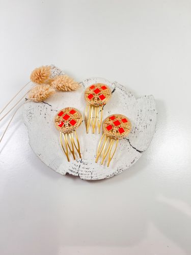 Peinecillo moneda naranja