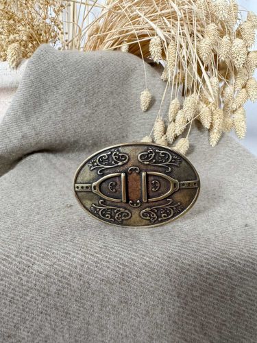 Hebilla ovalada estribo oro viejo