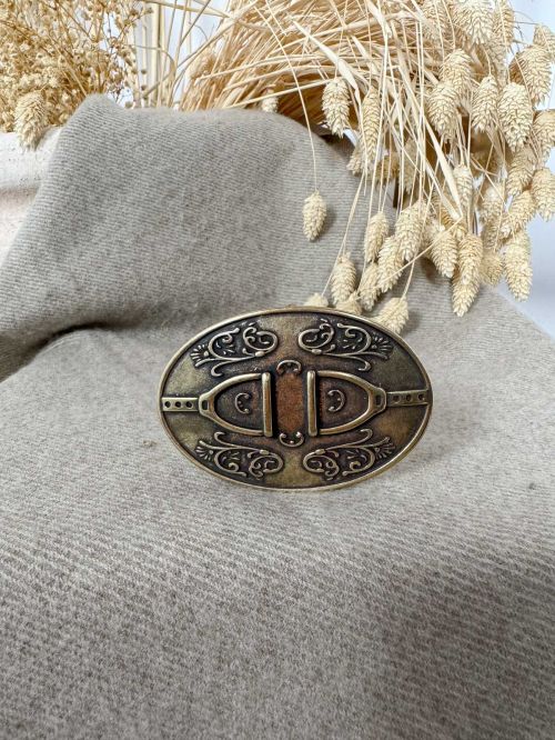 Hebilla ovalada estribo oro viejo