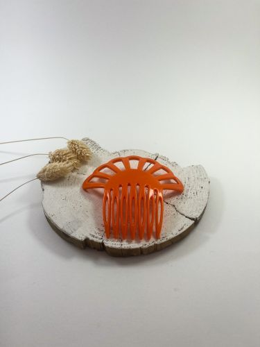 Peineta niña 7 arcos de acetato naranja