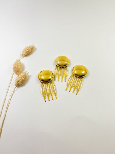 Peinecillo botón dorado