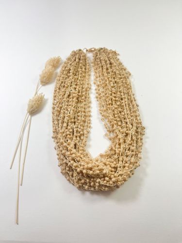 Collar cascada mini bolas topo