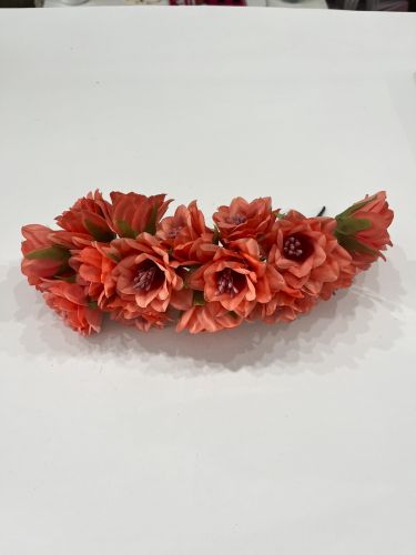 Corona flores pistilos color salmón