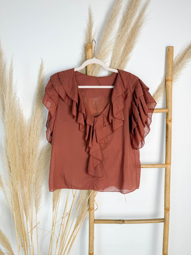 Blusa caldera escote de pico doble volante escote y sisa