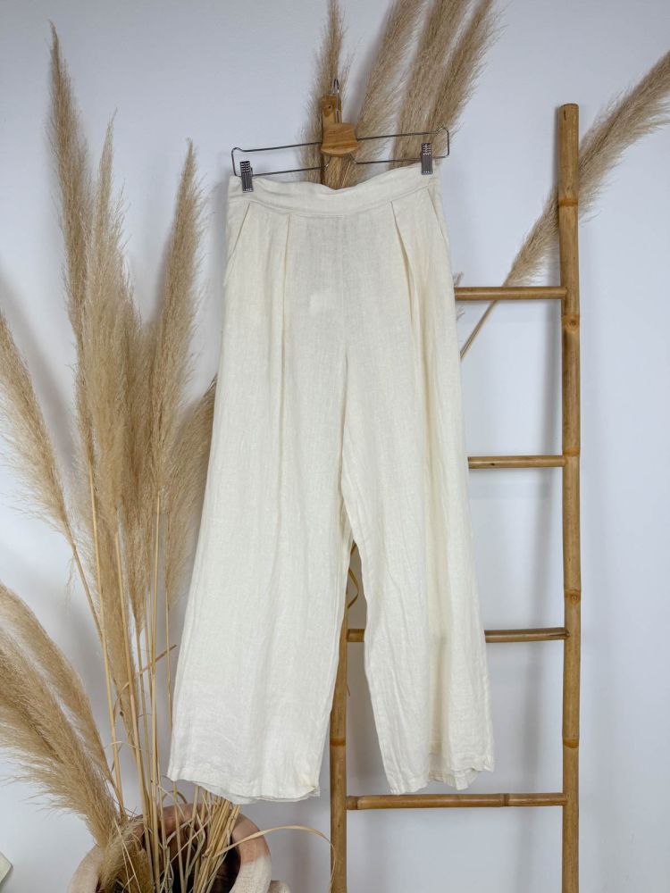 Pantalón de pinzas crudo de lino