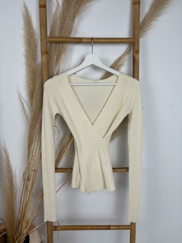 Chaleco beige de canalé en pico 2