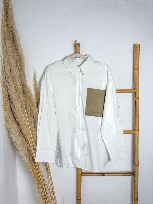 Blusa blanca oversice con caballos...