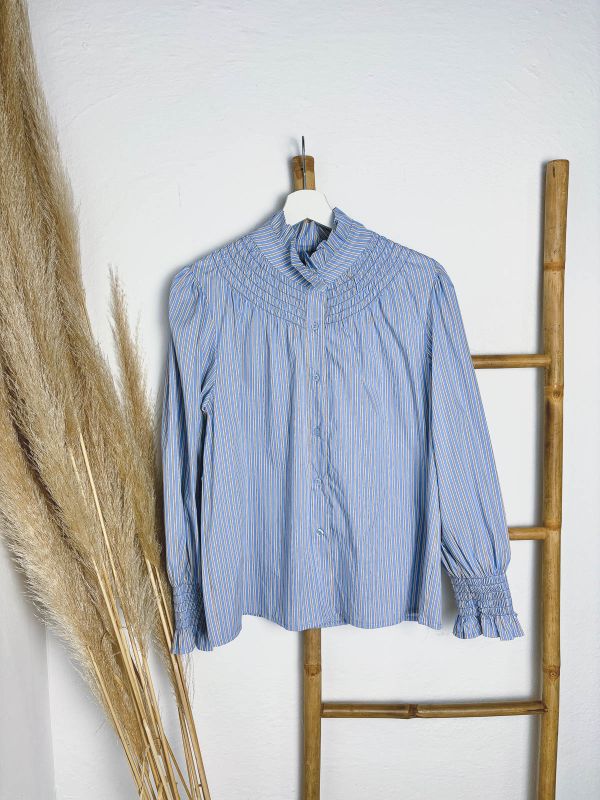 Blusa de rayas celeste y camel con...