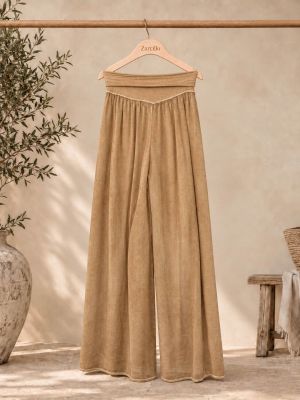 Pantalòn gasa color tierra cinttura elastica.