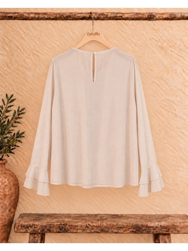 Blusa de gasa beige de volantes