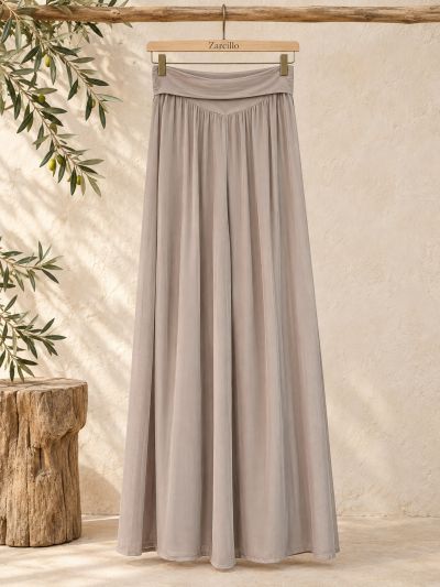 Pantalón de mujer seda, color beig, cintura elàstica.