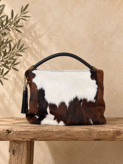 Bolso piel de vaca grande.